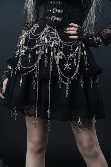 Black skirt with silver chains and skull designs on a white background